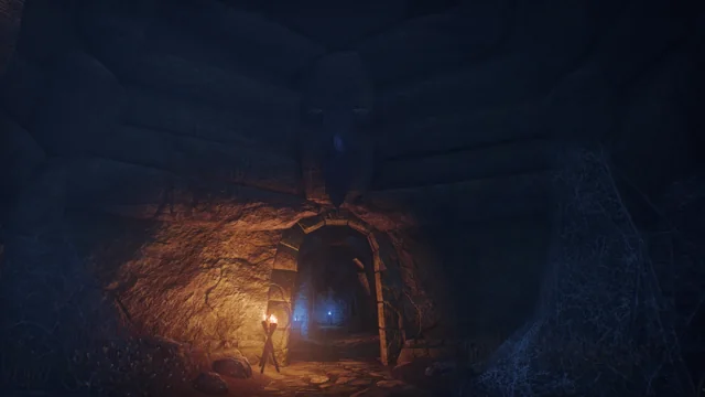 A torchlit arch, deeper in